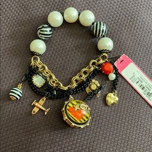 Betsey Johnson stretchy charm bracelet xox. NWT